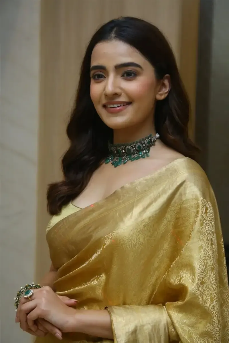 RUKSHAR DHILLON IN YELLOW SAREE AT MOVIE TEASER LAUNCH 10